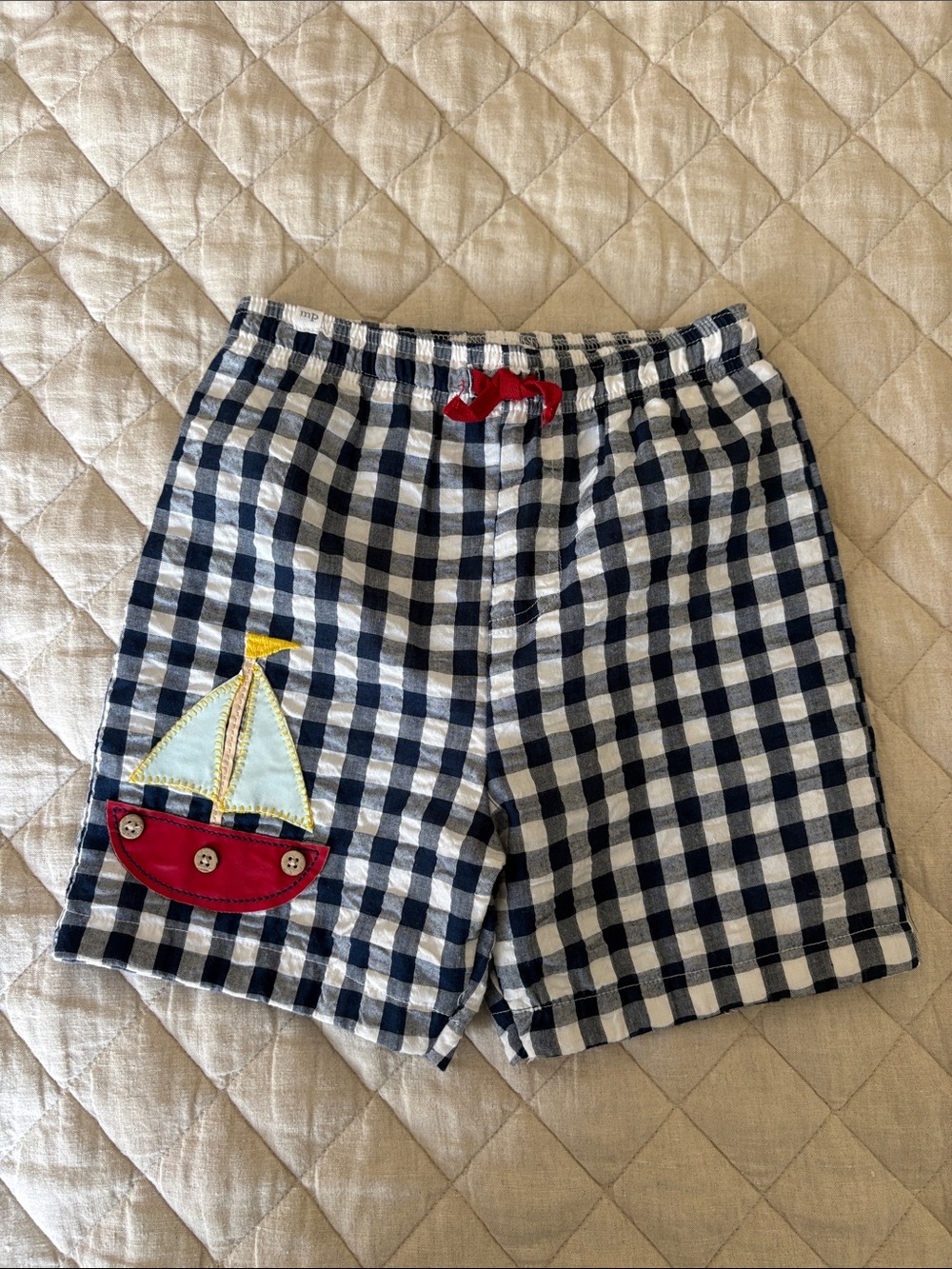 Mud Pie Navy and White Gingham Swim Trunks with Sailboat Patch